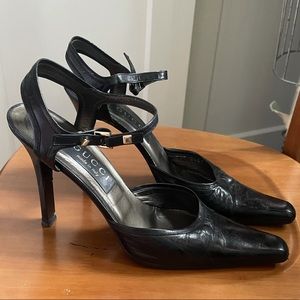 Gucci Black sling-back high heel shoes.